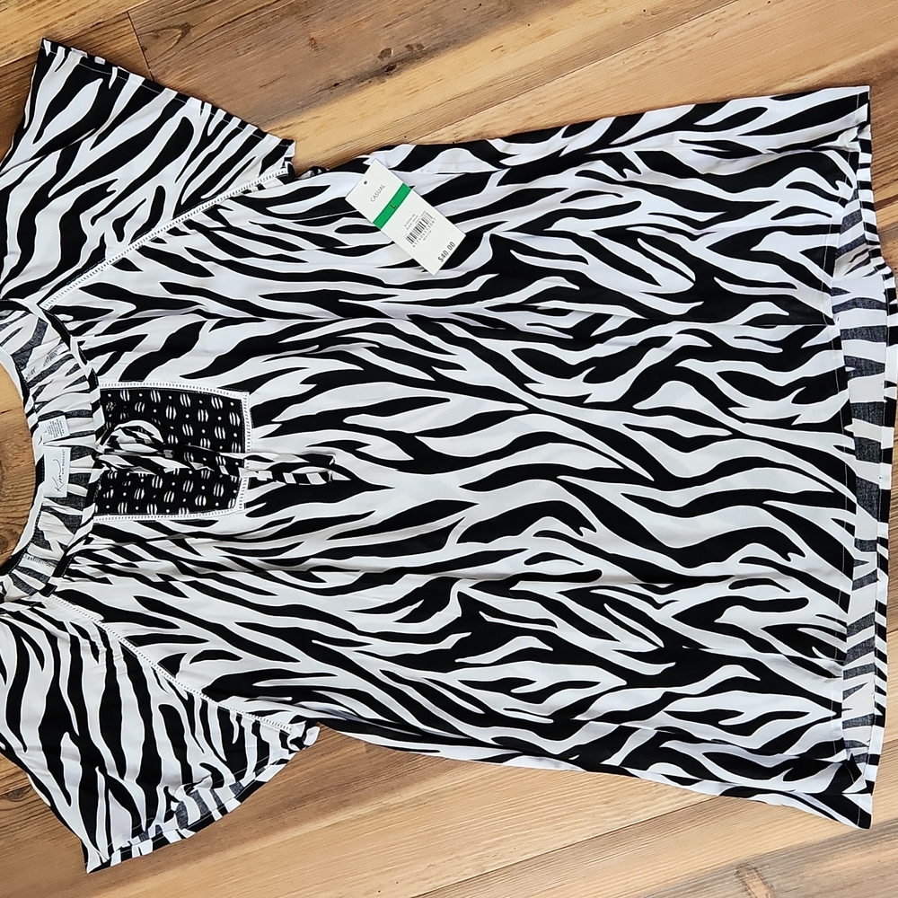 Kim Rogers,  size Large, black & white